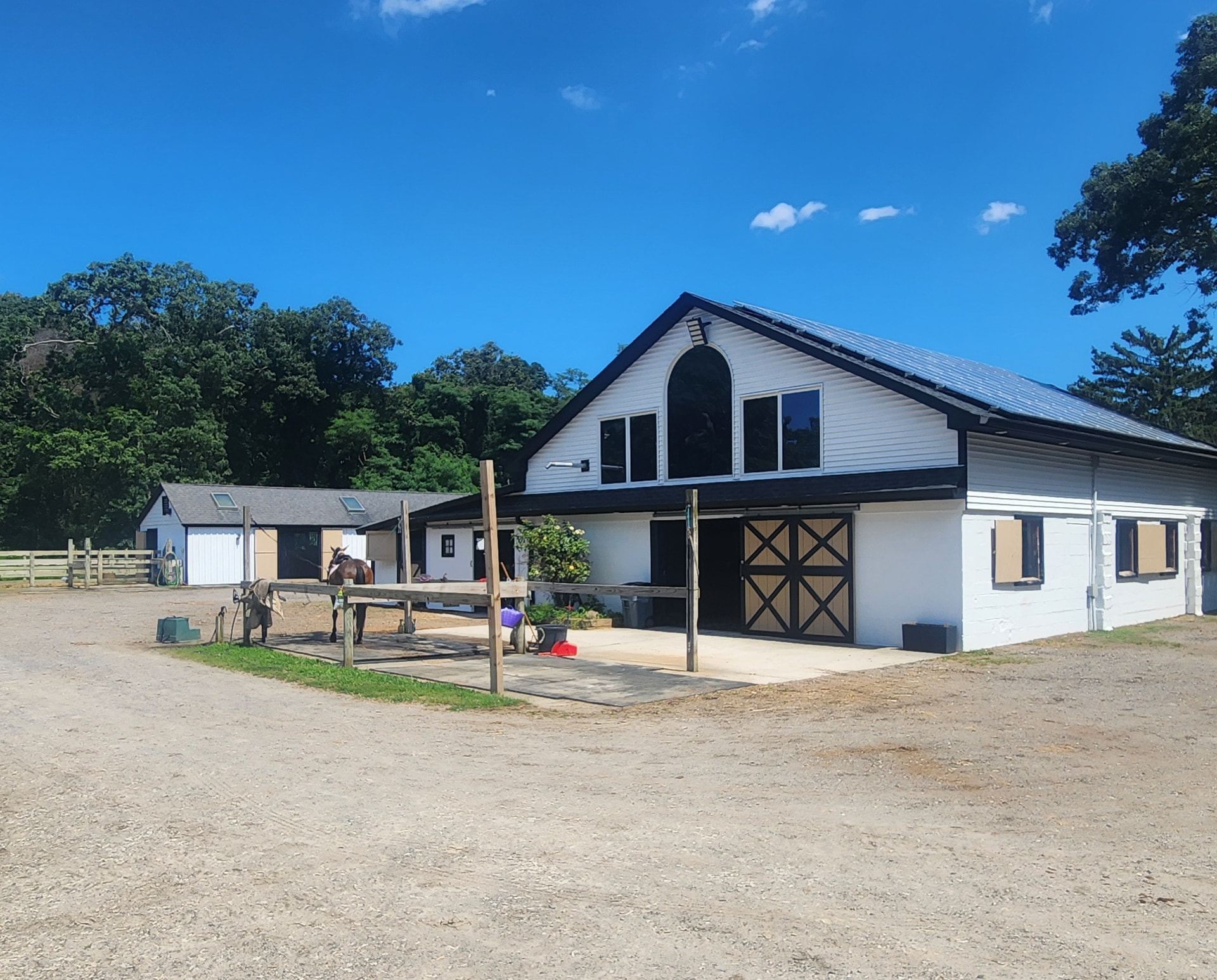 The main barn at Rising Talent Equestrian in Yaphank, New York
